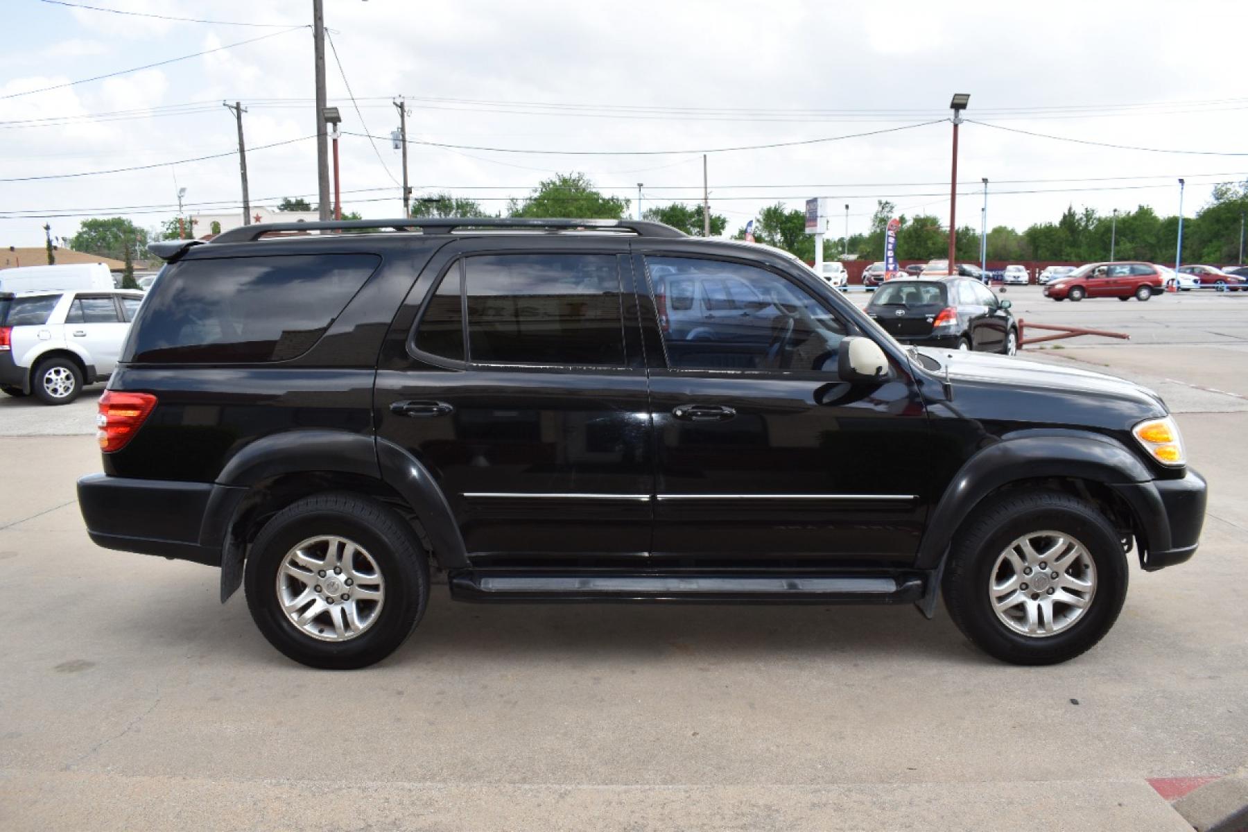 2004 Black /Black Toyota Sequoia Limited 2WD (5TDZT38A14S) with an 4.7L V8 DOHC 32V engine, 4-Speed Automatic Overdrive transmission, located at 5925 E. BELKNAP ST., HALTOM CITY, TX, 76117, (817) 834-4222, 32.803799, -97.259003 - Call 817-834-4222 NOW or Apply ONLINE ANYTIME...24/7!! All our vehicles are priced under $9K Inventory Changes Daily!! Easy, simple financing available!! We know you need reliable transportation to get you to work, home, and play. This Vehicle has a Clean Carfax Report!! Rides and Drives gre - Photo #3