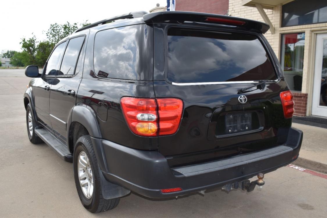 2004 Black /Black Toyota Sequoia Limited 2WD (5TDZT38A14S) with an 4.7L V8 DOHC 32V engine, 4-Speed Automatic Overdrive transmission, located at 5925 E. BELKNAP ST., HALTOM CITY, TX, 76117, (817) 834-4222, 32.803799, -97.259003 - Photo #5