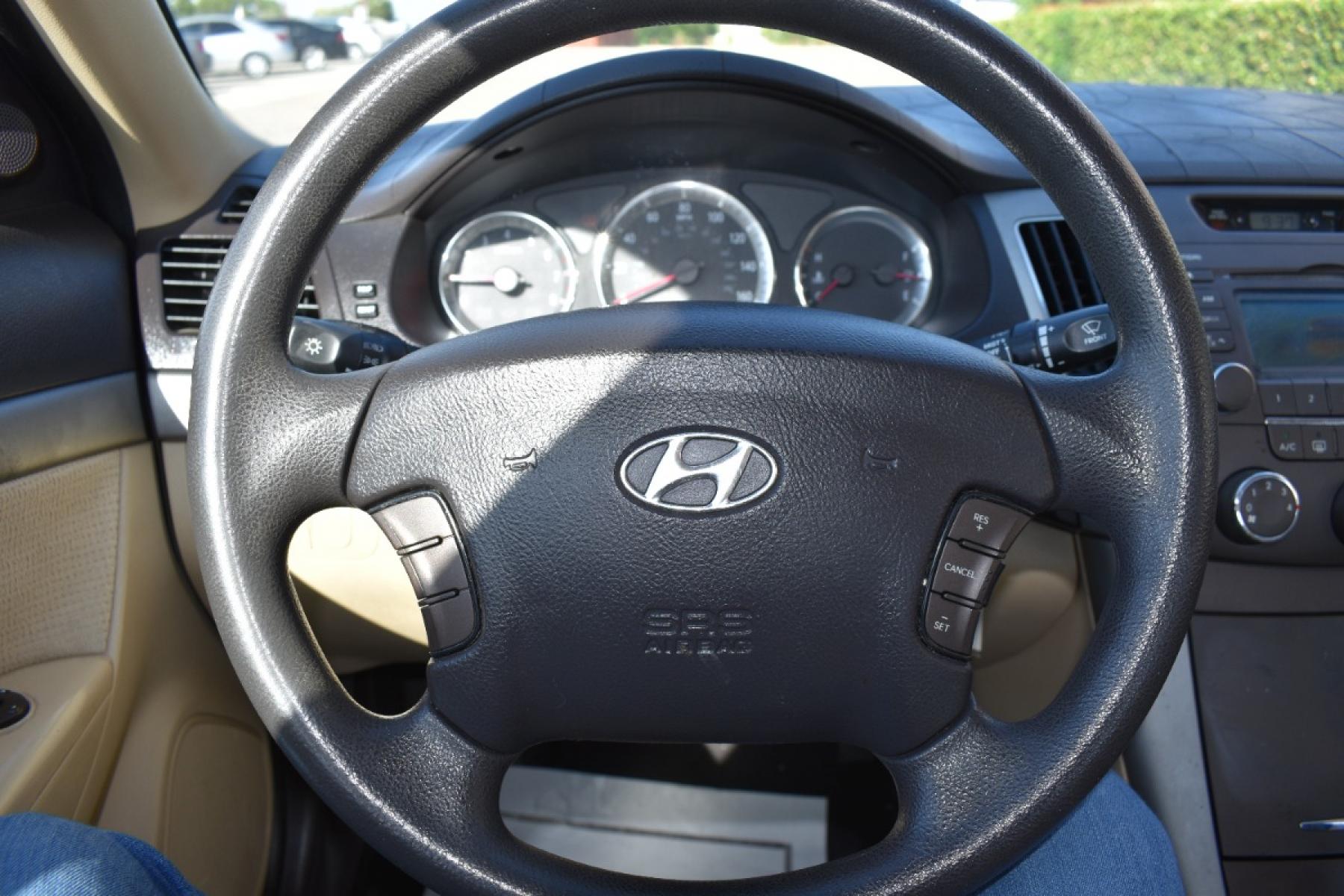2009 Green /Tan Hyundai Sonata GLS (5NPET46C29H) with an 2.4L L4 DOHC 16V engine, Automatic 5 Spped transmission, located at 5925 E. BELKNAP ST., HALTOM CITY, TX, 76117, (817) 834-4222, 32.803799, -97.259003 - This Vehicle has a Clean Carfax Report!! Rides and Drives great, it just needs YOU Behind the Wheel!! Call Us at (817) 834-4222 Easy, simple financing available!! We know you need reliable transportation to get you to work, home, and play. Yet, so many people are denied the financing options that ar - Photo #10