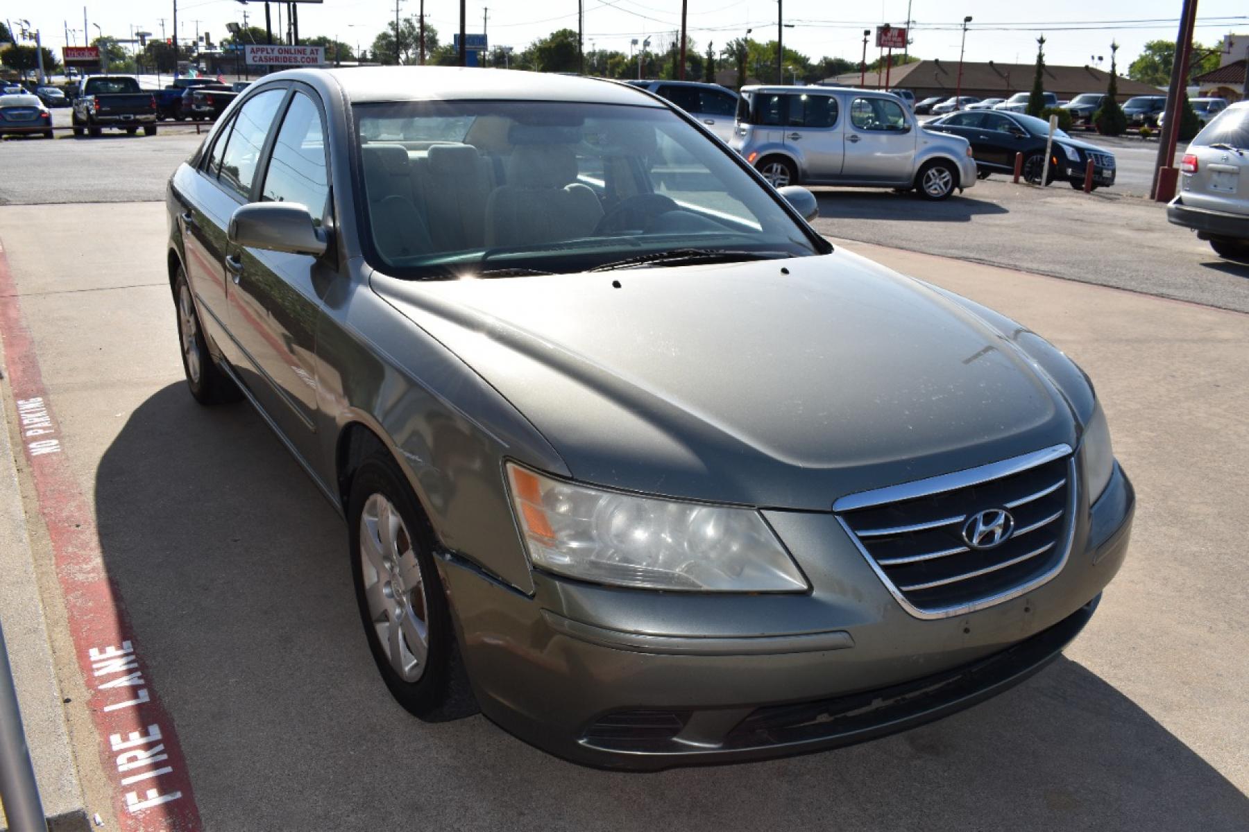 2009 Green /Tan Hyundai Sonata GLS (5NPET46C29H) with an 2.4L L4 DOHC 16V engine, Automatic 5 Spped transmission, located at 5925 E. BELKNAP ST., HALTOM CITY, TX, 76117, (817) 834-4222, 32.803799, -97.259003 - Call 817-834-4222 NOW or Apply ONLINE ANYTIME...24/7!! All our vehicles are priced under $9K Inventory Changes Daily!! Easy, simple financing available!! We know you need reliable transportation to get you to work, home, and play. This Vehicle has a Clean Carfax Report!! Rides and Drives gre - Photo #2