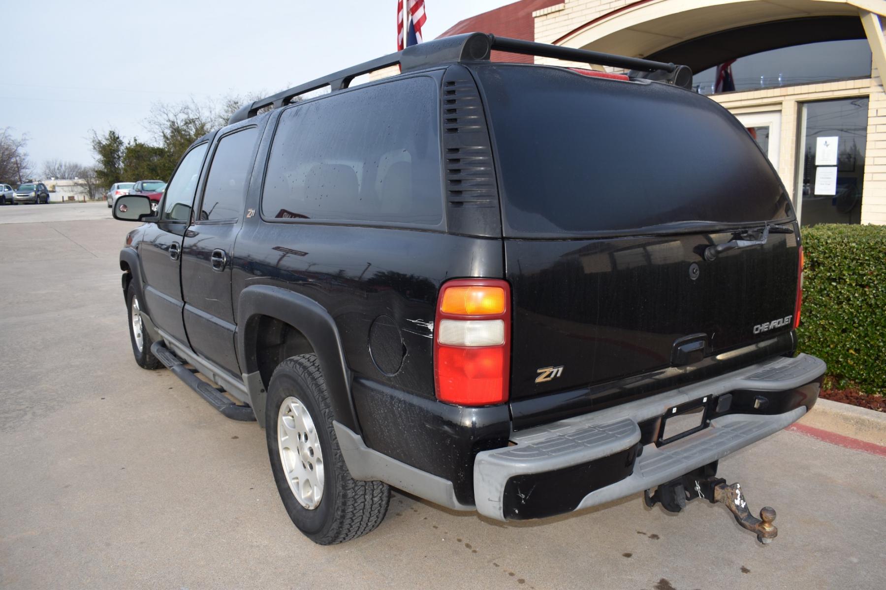 2003 Black /Beige Chevrolet Suburban 1500 4WD (3GNFK16Z13G) with an 5.3L V8 OHV 16V FFV engine, 4-Speed Automatic Overdrive transmission, located at 5925 E. BELKNAP ST., HALTOM CITY, TX, 76117, (817) 834-4222, 32.803799, -97.259003 - Photo #6