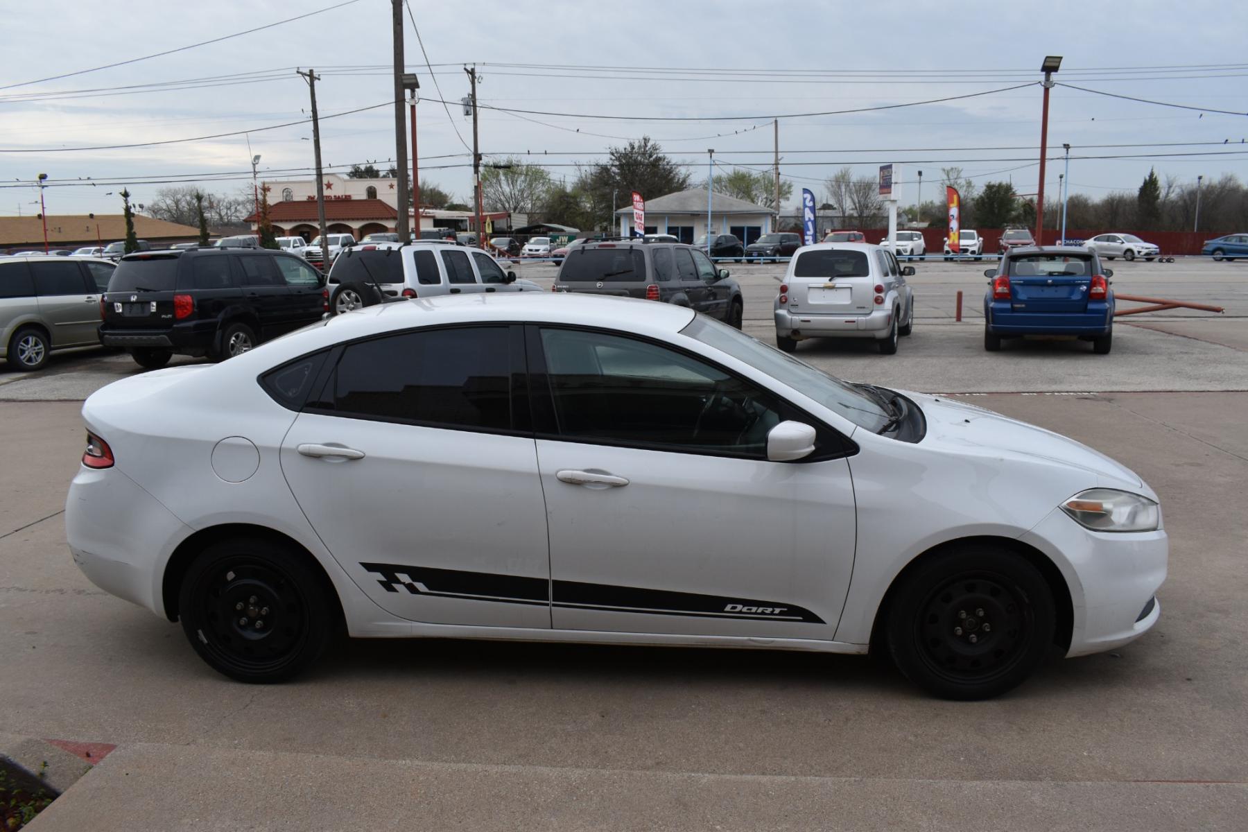 2016 White /Black Dodge Dart SE (1C3CDFAA0GD) with an 2.0L L4 DOHC 16V TURBO engine, 6 SPEED AUTOMATIC transmission, located at 5925 E. BELKNAP ST., HALTOM CITY, TX, 76117, (817) 834-4222, 32.803799, -97.259003 - The decision to buy a 2016 Dodge Dart SE should be based on your specific needs and preferences, but here are some reasons why you might consider this vehicle: Affordability: The 2016 Dodge Dart SE is often available at a competitive price point, making it an attractive option for budget-conscious - Photo #3