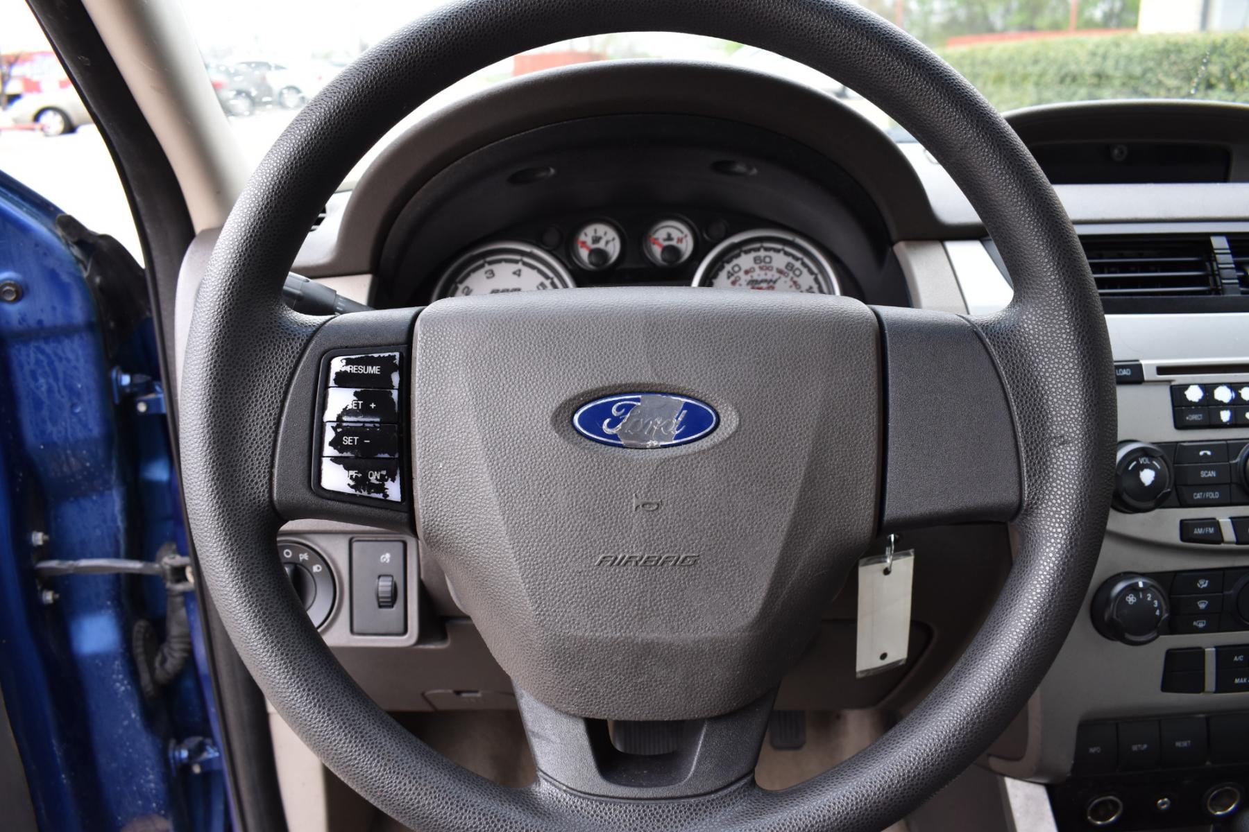 2009 Blue /Gray Ford Focus SE Sedan (1FAHP35N19W) with an 2.0L L4 DOHC 16V engine, AUTOMATIC transmission, located at 5925 E. BELKNAP ST., HALTOM CITY, TX, 76117, (817) 834-4222, 32.803799, -97.259003 - Photo #10