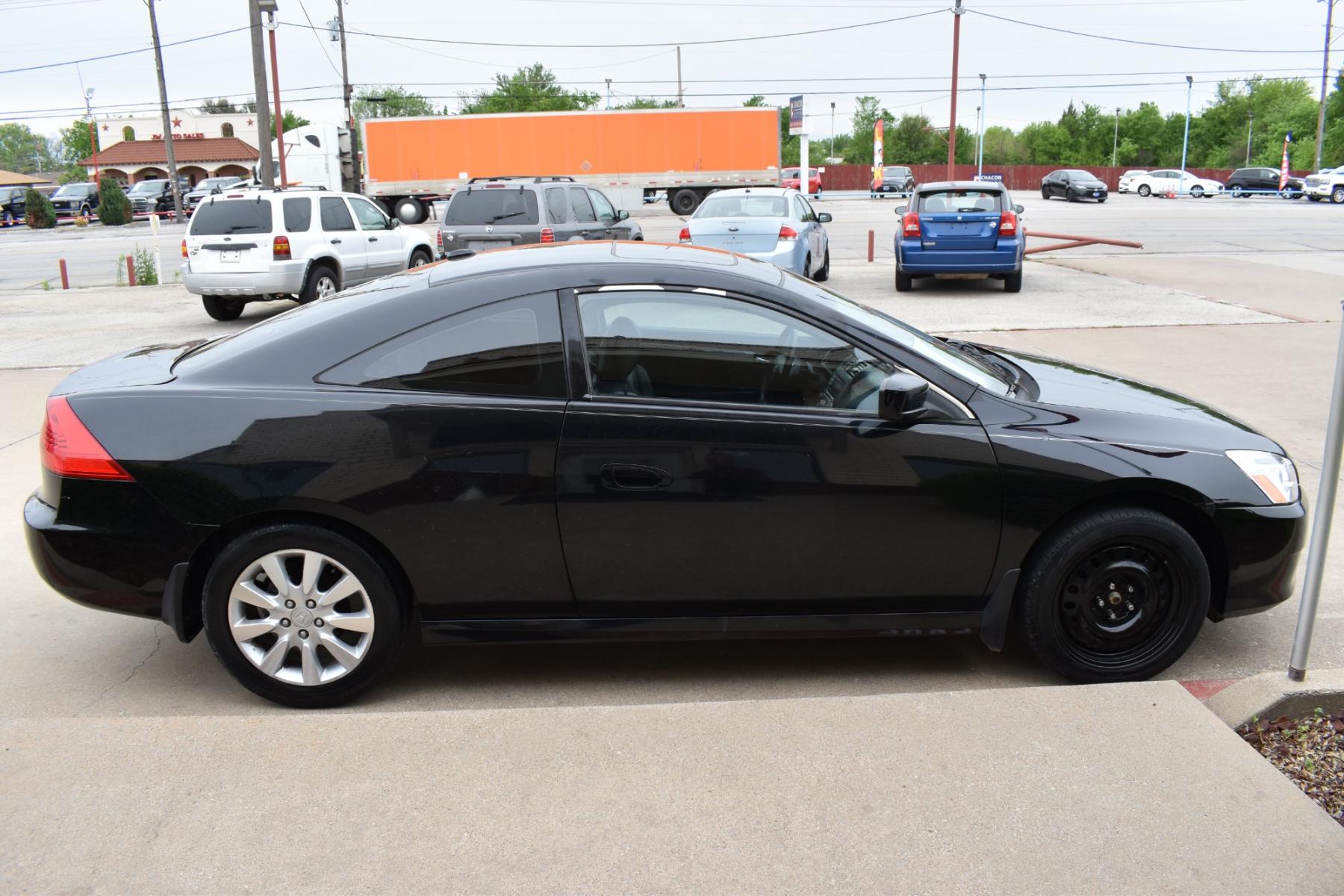 2006 Black /Black Honda Accord EX V-6 Coupe AT w/ XM Radio (1HGCM82626A) with an 3.0L V6 SOHC 24V engine, 5-Speed Automatic Overdrive transmission, located at 5925 E. BELKNAP ST., HALTOM CITY, TX, 76117, (817) 834-4222, 32.803799, -97.259003 - Purchasing a 2006 Honda Accord EX V-6 Coupe AT with XM Radio offers several compelling reasons: Reliability: Honda is renowned for building reliable vehicles, and the 2006 Accord is no exception. It's known for its longevity and low maintenance costs, providing peace of mind for years to come. Pow - Photo #3