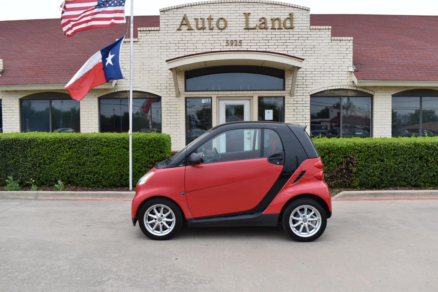 2009 Red /Red smart Fortwo Passion (WMEEJ31X69K) with an 1.0L L3 DOHC 12V engine, 5-Speed Manual transmission, located at 5925 E. BELKNAP ST., HALTOM CITY, TX, 76117, (817) 834-4222, 32.803799, -97.259003 - This Vehicle has a Clean Carfax Report!! Rides and Drives great, it just needs YOU Behind the Wheel!! Call Us at (817) 834-4222 Easy, simple financing available!! We know you need reliable transportation to get you to work, home, and play. Yet, so many people are denied the financing options that ar - Photo #0