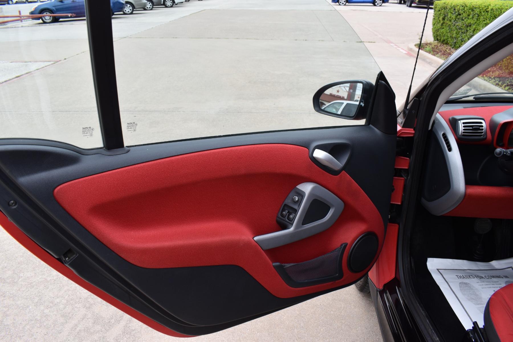 2009 Red /Red smart Fortwo Passion (WMEEJ31X69K) with an 1.0L L3 DOHC 12V engine, 5-Speed Manual transmission, located at 5925 E. BELKNAP ST., HALTOM CITY, TX, 76117, (817) 834-4222, 32.803799, -97.259003 - This Vehicle has a Clean Carfax Report!! Rides and Drives great, it just needs YOU Behind the Wheel!! Call Us at (817) 834-4222 Easy, simple financing available!! We know you need reliable transportation to get you to work, home, and play. Yet, so many people are denied the financing options that ar - Photo #6