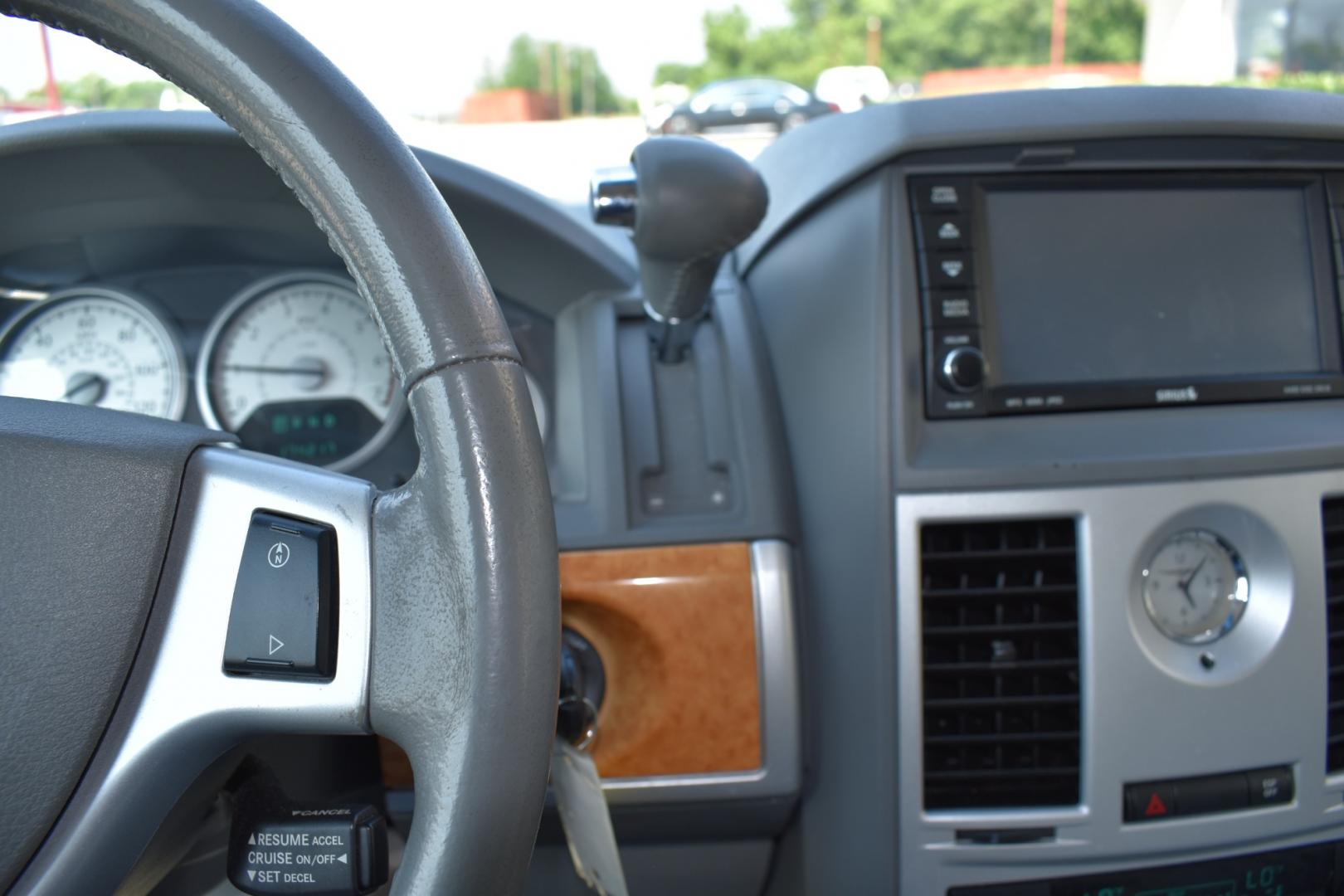 2008 Red /Beige Chrysler Town & Country Limited (2A8HR64X38R) with an 4.0L V6 SOHC 24V engine, 6-Speed Automatic Overdrive transmission, located at 5925 E. BELKNAP ST., HALTOM CITY, TX, 76117, (817) 834-4222, 32.803799, -97.259003 - Purchasing a 2008 Chrysler Town & Country Limited can be a great choice for several reasons: Luxury and Comfort: The Town & Country Limited is the top trim level for this minivan, offering a luxurious and comfortable interior. It often includes features like leather upholstery, power-adjustable sea - Photo#15