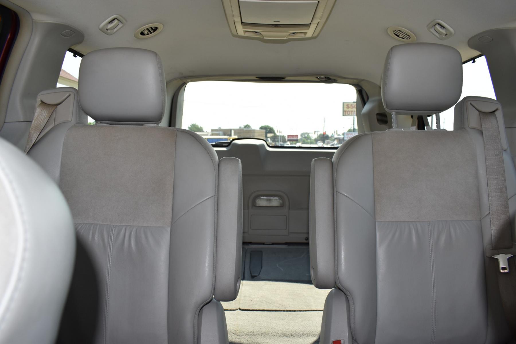 2008 Red /Beige Chrysler Town & Country Limited (2A8HR64X38R) with an 4.0L V6 SOHC 24V engine, 6-Speed Automatic Overdrive transmission, located at 5925 E. BELKNAP ST., HALTOM CITY, TX, 76117, (817) 834-4222, 32.803799, -97.259003 - Purchasing a 2008 Chrysler Town & Country Limited can be a great choice for several reasons: Luxury and Comfort: The Town & Country Limited is the top trim level for this minivan, offering a luxurious and comfortable interior. It often includes features like leather upholstery, power-adjustable sea - Photo #26