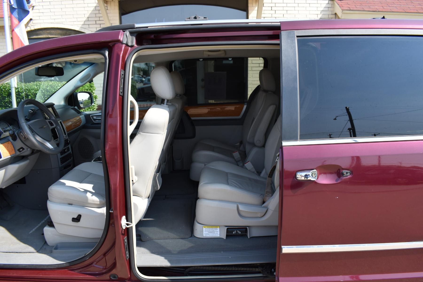 2008 Red /Beige Chrysler Town & Country Limited (2A8HR64X38R) with an 4.0L V6 SOHC 24V engine, 6-Speed Automatic Overdrive transmission, located at 5925 E. BELKNAP ST., HALTOM CITY, TX, 76117, (817) 834-4222, 32.803799, -97.259003 - Purchasing a 2008 Chrysler Town & Country Limited can be a great choice for several reasons: Luxury and Comfort: The Town & Country Limited is the top trim level for this minivan, offering a luxurious and comfortable interior. It often includes features like leather upholstery, power-adjustable sea - Photo #27