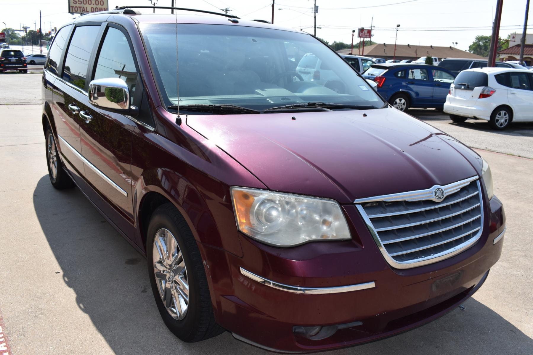 2008 Red /Beige Chrysler Town & Country Limited (2A8HR64X38R) with an 4.0L V6 SOHC 24V engine, 6-Speed Automatic Overdrive transmission, located at 5925 E. BELKNAP ST., HALTOM CITY, TX, 76117, (817) 834-4222, 32.803799, -97.259003 - Purchasing a 2008 Chrysler Town & Country Limited can be a great choice for several reasons: Luxury and Comfort: The Town & Country Limited is the top trim level for this minivan, offering a luxurious and comfortable interior. It often includes features like leather upholstery, power-adjustable sea - Photo #2