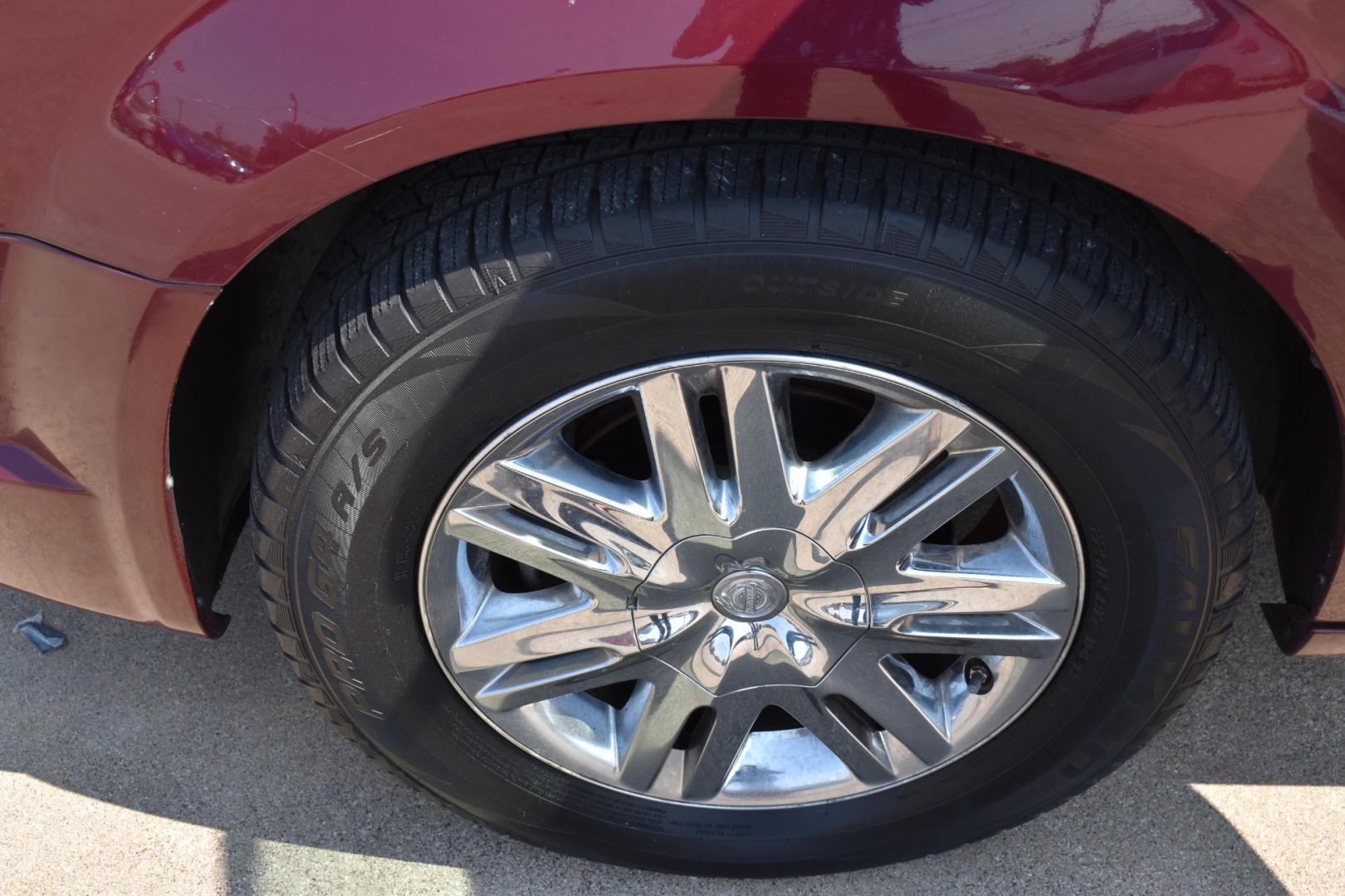 2008 Red /Beige Chrysler Town & Country Limited (2A8HR64X38R) with an 4.0L V6 SOHC 24V engine, 6-Speed Automatic Overdrive transmission, located at 5925 E. BELKNAP ST., HALTOM CITY, TX, 76117, (817) 834-4222, 32.803799, -97.259003 - Purchasing a 2008 Chrysler Town & Country Limited can be a great choice for several reasons: Luxury and Comfort: The Town & Country Limited is the top trim level for this minivan, offering a luxurious and comfortable interior. It often includes features like leather upholstery, power-adjustable sea - Photo#39