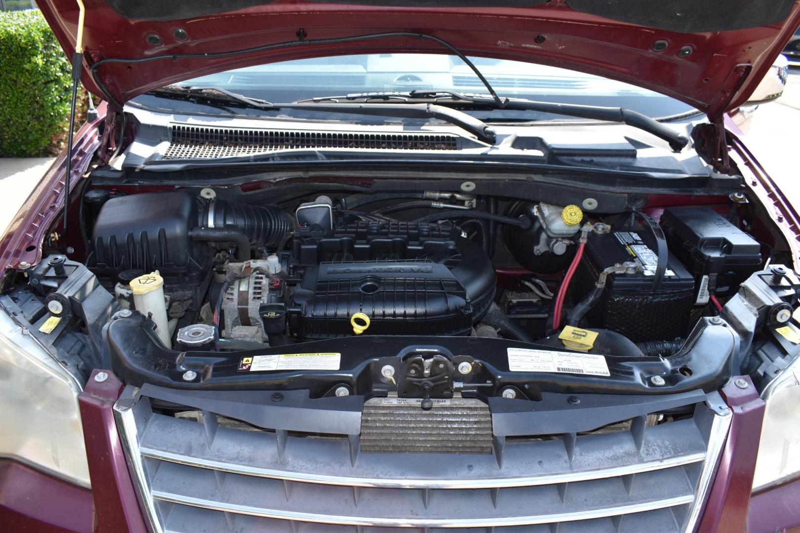 2008 Red /Beige Chrysler Town & Country Limited (2A8HR64X38R) with an 4.0L V6 SOHC 24V engine, 6-Speed Automatic Overdrive transmission, located at 5925 E. BELKNAP ST., HALTOM CITY, TX, 76117, (817) 834-4222, 32.803799, -97.259003 - Purchasing a 2008 Chrysler Town & Country Limited can be a great choice for several reasons: Luxury and Comfort: The Town & Country Limited is the top trim level for this minivan, offering a luxurious and comfortable interior. It often includes features like leather upholstery, power-adjustable sea - Photo#6