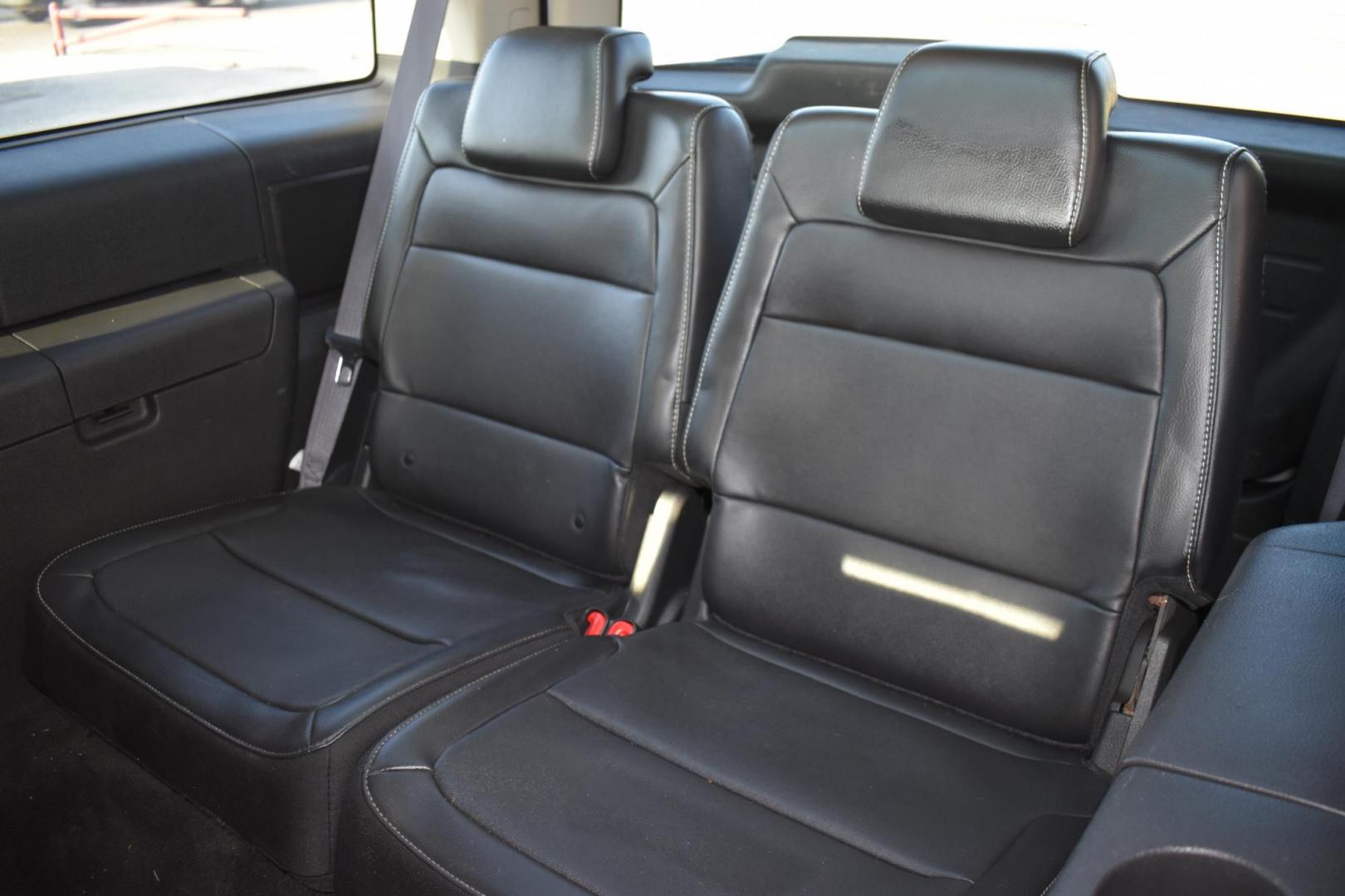 2009 White /Black Ford Flex SEL FWD (2FMDK52C39B) with an 3.5L V6 DOHC 24V engine, 6-Speed Automatic transmission, located at 5925 E. BELKNAP ST., HALTOM CITY, TX, 76117, (817) 834-4222, 32.803799, -97.259003 - Purchasing a 2009 Ford Flex SEL FWD can be a smart choice for several reasons: Unique and Stylish Design: The Ford Flex stands out with its distinctive and boxy design. It offers a unique and appealing look that sets it apart from more traditional SUVs and crossovers. Spacious Interior: The Flex i - Photo#19
