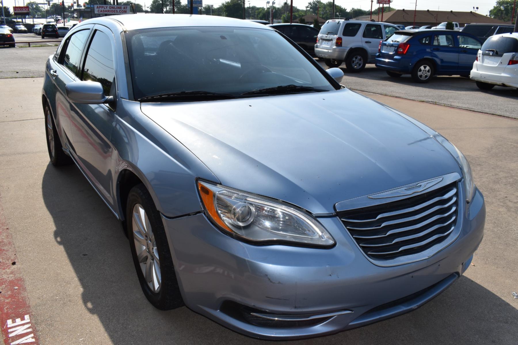 2013 Blue /Black Chrysler 200 Touring (1C3CCBBB5DN) with an 2.4L L4 DOHC 16V engine, 6-Speed Automatic transmission, located at 5925 E. BELKNAP ST., HALTOM CITY, TX, 76117, (817) 834-4222, 32.803799, -97.259003 - Photo #2