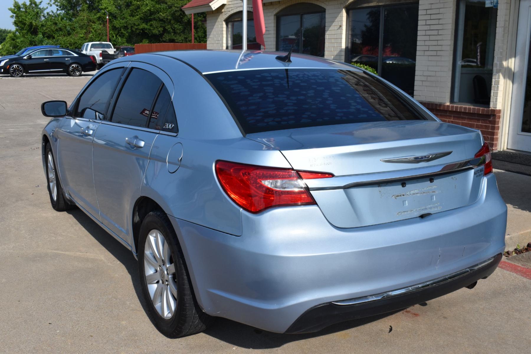 2013 Blue /Black Chrysler 200 Touring (1C3CCBBB5DN) with an 2.4L L4 DOHC 16V engine, 6-Speed Automatic transmission, located at 5925 E. BELKNAP ST., HALTOM CITY, TX, 76117, (817) 834-4222, 32.803799, -97.259003 - Photo #5