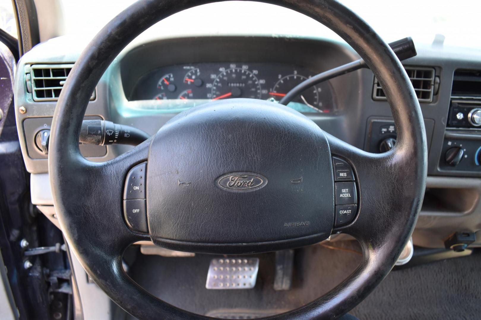 2000 Blue /Gray Ford F-250 SD Lariat SuperCab Long Bed 4WD (1FTNX21L3YE) with an 5.4L V8 SOHC 16V engine, 4 SPEED AUTOMATIC 4X4 transmission, located at 5925 E. BELKNAP ST., HALTOM CITY, TX, 76117, (817) 834-4222, 32.803799, -97.259003 - Photo#12