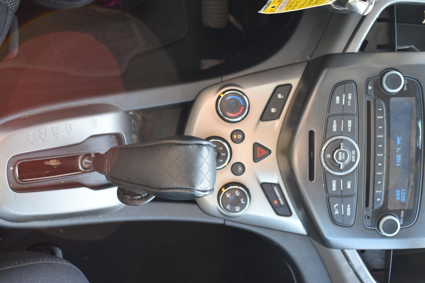 2012 Black /Gray Chevrolet Sonic (1G1JC5SH9C4) with an 4.1.8L engine, 6-Speed Automatic transmission, located at 5925 E. BELKNAP ST., HALTOM CITY, TX, 76117, (817) 834-4222, 32.803799, -97.259003 - The 2012 Chevrolet Sonic offers several benefits. Here are a few: 1. Fuel Efficiency: The Sonic is known for its impressive fuel efficiency, making it a cost-effective choice for daily commuting and long drives. 2. Compact Size: The Sonic's compact size makes it easy to maneuver in tight city stre - Photo#12