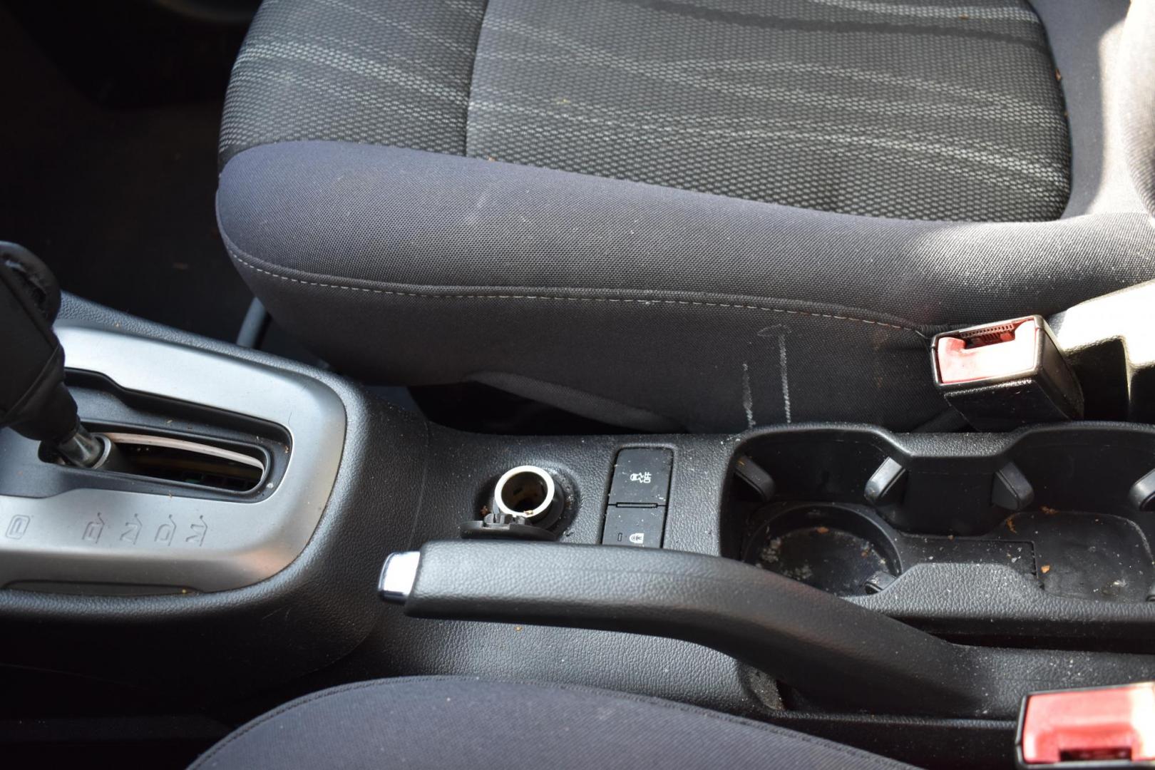 2012 Black /Gray Chevrolet Sonic (1G1JC5SH9C4) with an 4.1.8L engine, 6-Speed Automatic transmission, located at 5925 E. BELKNAP ST., HALTOM CITY, TX, 76117, (817) 834-4222, 32.803799, -97.259003 - The 2012 Chevrolet Sonic offers several benefits. Here are a few: 1. Fuel Efficiency: The Sonic is known for its impressive fuel efficiency, making it a cost-effective choice for daily commuting and long drives. 2. Compact Size: The Sonic's compact size makes it easy to maneuver in tight city stre - Photo#13