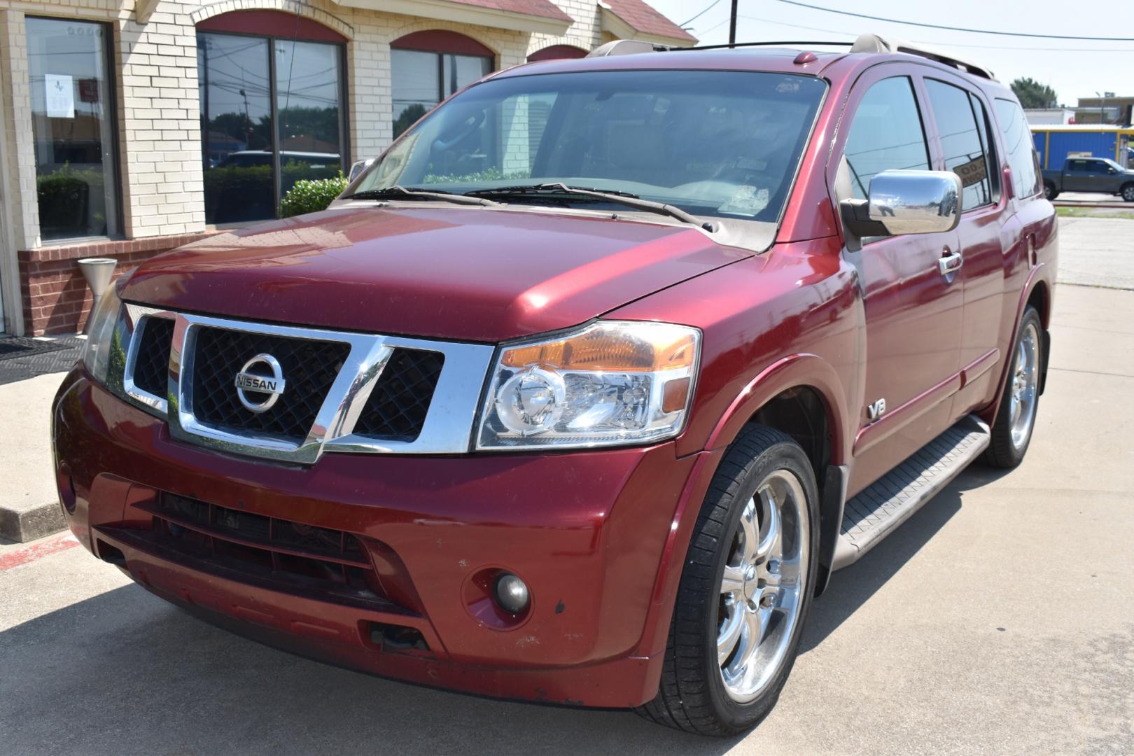 2009 Red /Tan Nissan Armada (5N1AA08C49N) with an V8 5.6 L engine, 5 SPEED AUTOMATIC transmission, located at 5925 E. BELKNAP ST., HALTOM CITY, TX, 76117, (817) 834-4222, 32.803799, -97.259003 - Buying a 2009 Nissan Armada offers several benefits: Powerful V8 Engine: The 2009 Nissan Armada is equipped with a robust 5.6-liter V8 engine, providing ample power for towing and hauling heavy loads. This engine delivers strong acceleration and performance, making it suitable for both daily driv - Photo#1