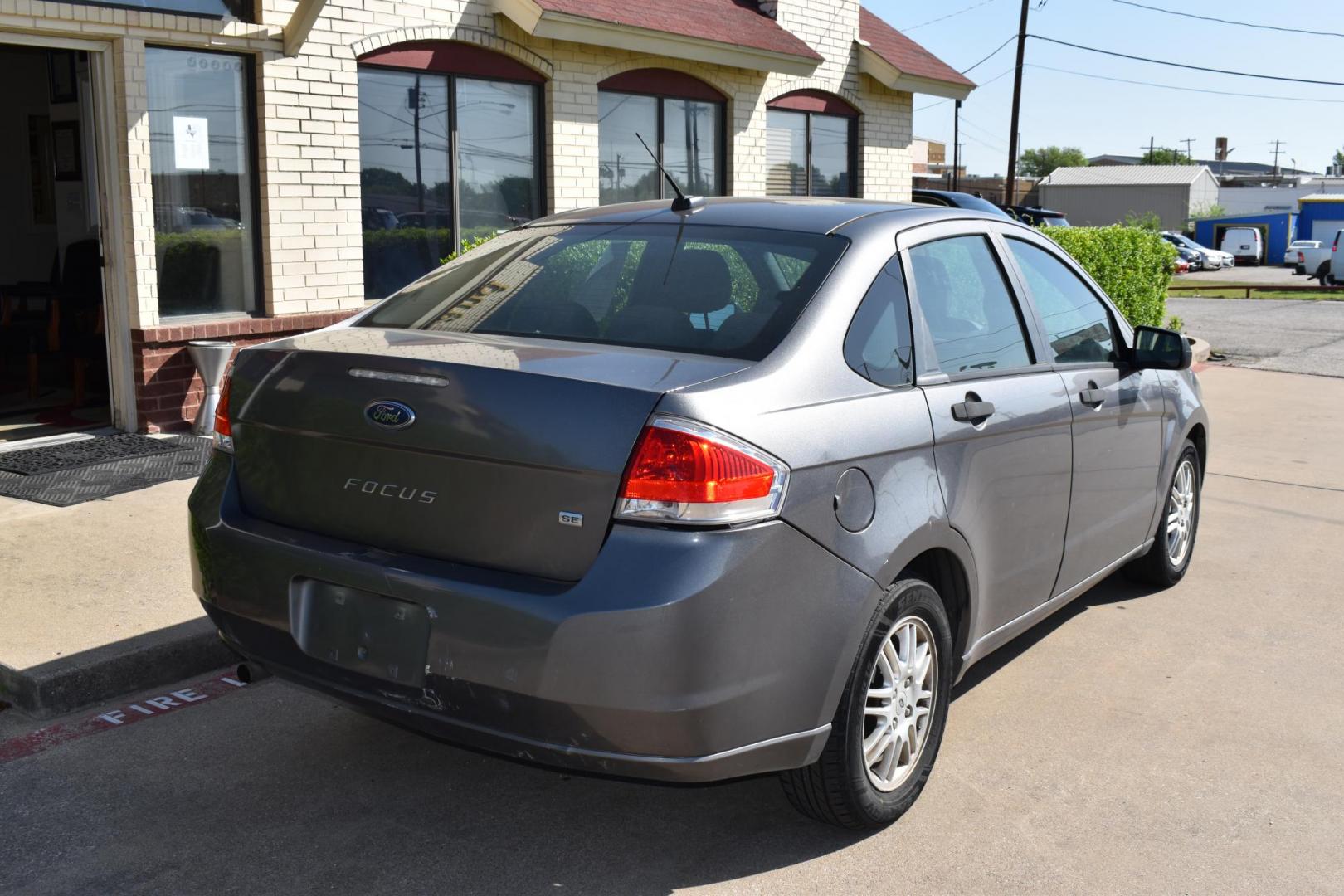 2011 Gray Ford Focus SE Sedan (1FAHP3FN5BW) with an 2.0L L4 DOHC 16V engine, 4-Speed Aut transmission, located at 5925 E. BELKNAP ST., HALTOM CITY, TX, 76117, (817) 834-4222, 32.803799, -97.259003 - $3,603.00 PLUS TT&L CASH ONLY NO FINANCING Buying a 2011 Ford Focus can offer several benefits, especially if you’re looking for an affordable, reliable, and fuel-efficient compact car. Here are some of the key advantages: 1. Affordable Purchase Price As a used car, the 2011 Ford Focus is - Photo#4